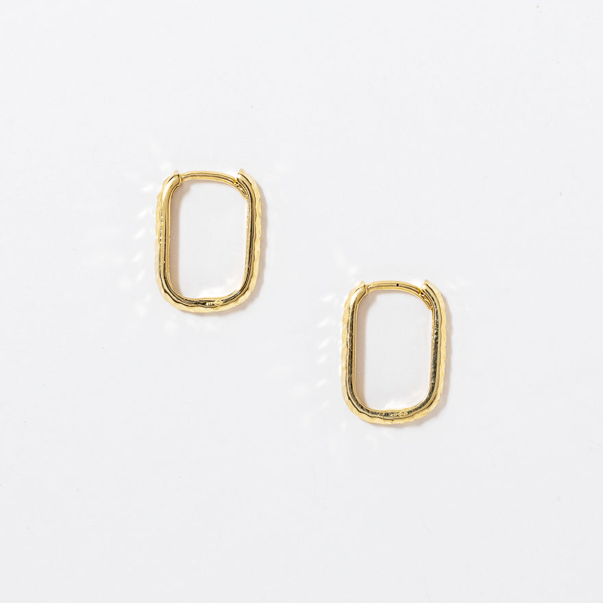 Diamond Cut Oval Huggie Earrings in 10K Yellow Gold