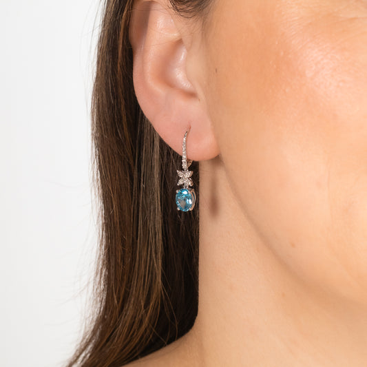 Blue Topaz Earrings in 10K White Gold