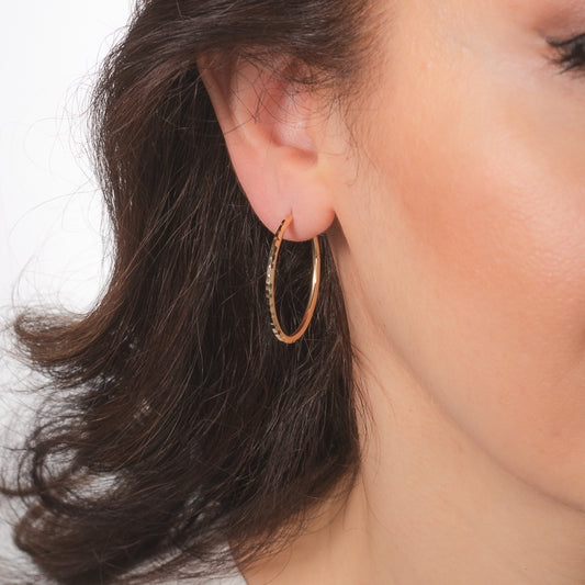 2x30mm Diamond Cut Oval Sleeper Hoop Earrings in 10K Yellow Gold