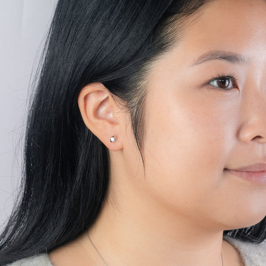 Tension Set Solitaire Canadian Diamond Stud Earrings in 14K White Gold (0.20ct tw)