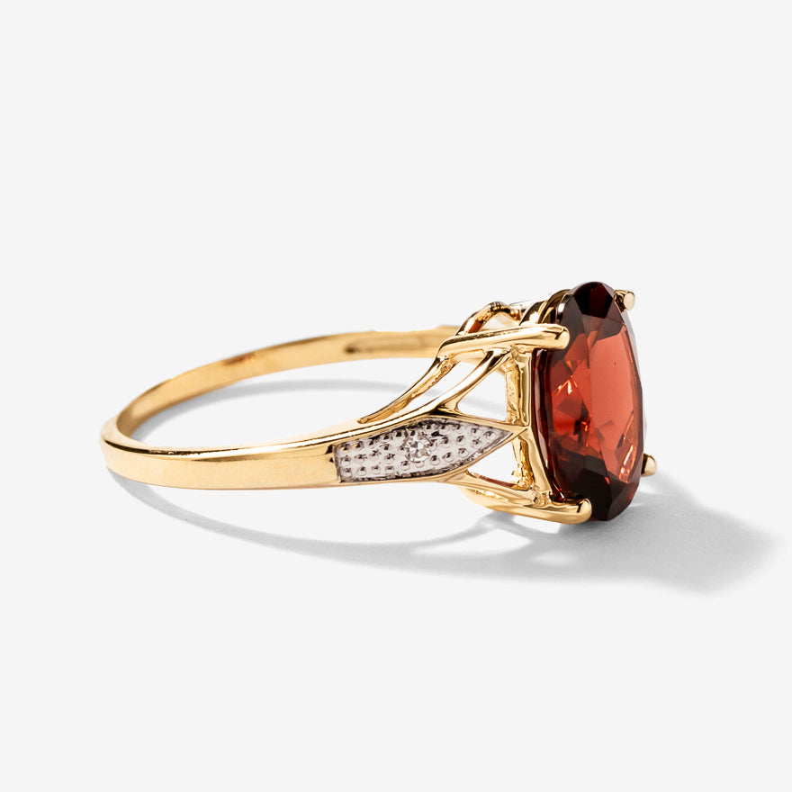 Oval Garnet Ring with Diamond Accents in 10K Yellow Gold