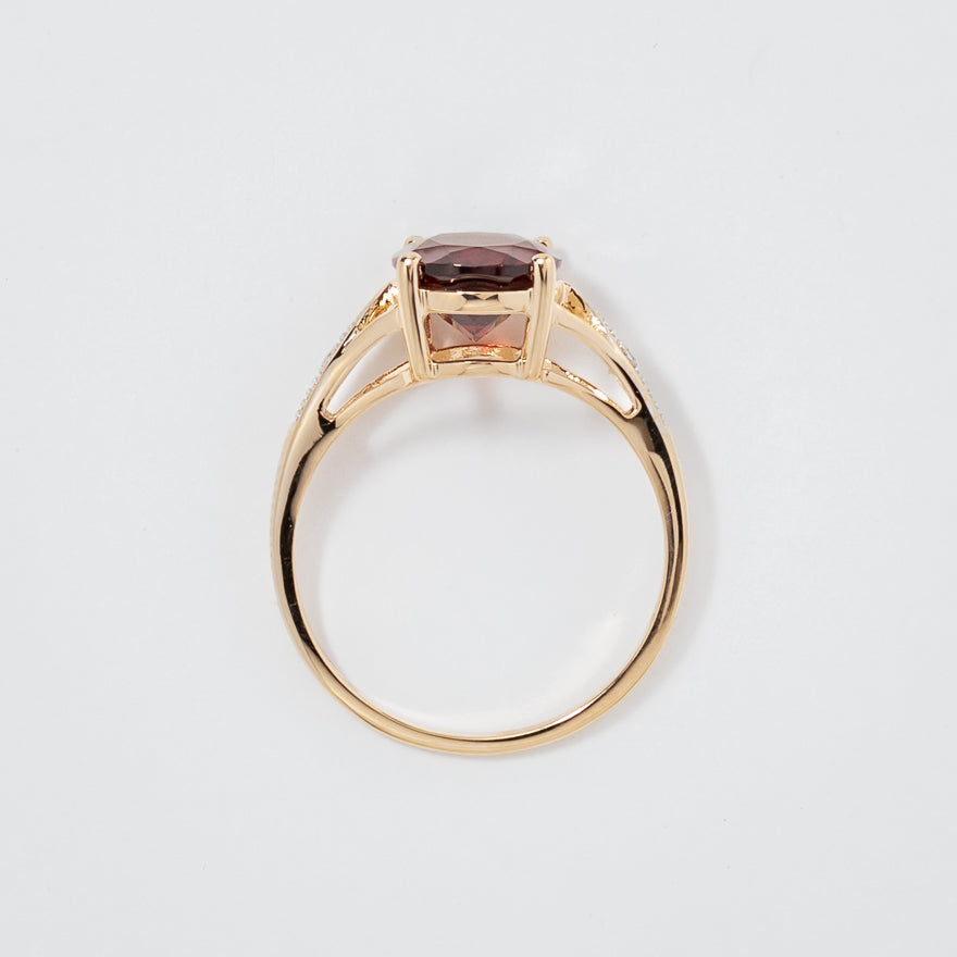 Oval Garnet Ring with Diamond Accents in 10K Yellow Gold