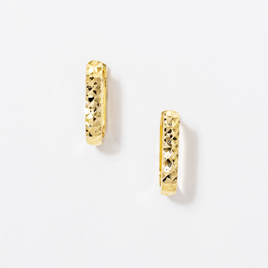 Diamond Cut Oval Huggie Earrings in 10K Yellow Gold