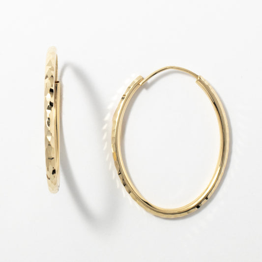 2x30mm Diamond Cut Oval Sleeper Hoop Earrings in 10K Yellow Gold