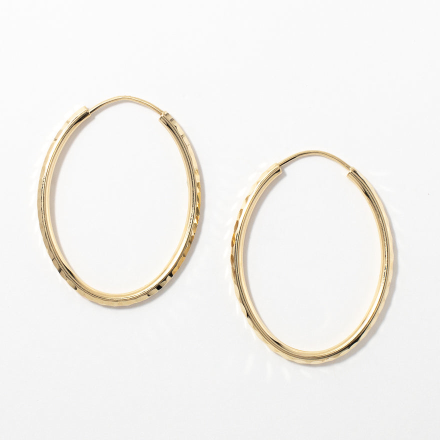 2x30mm Diamond Cut Oval Sleeper Hoop Earrings in 10K Yellow Gold