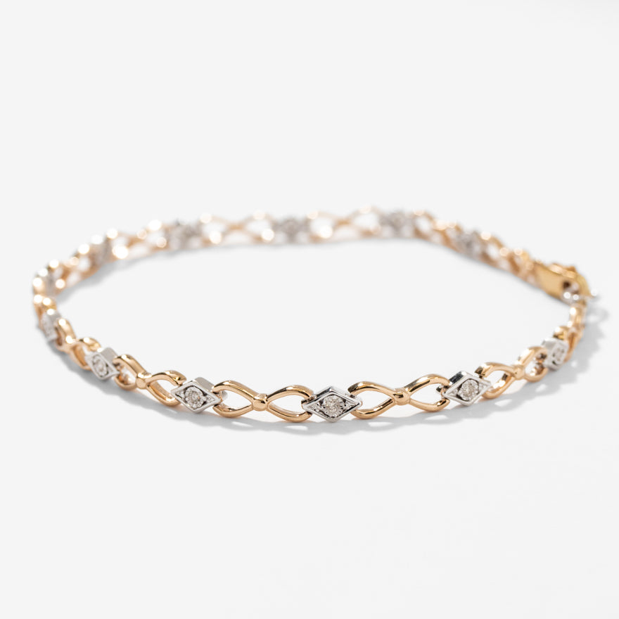 Diamond Link Bracelet in 10K Yellow and White Gold (0.10 ct tw)