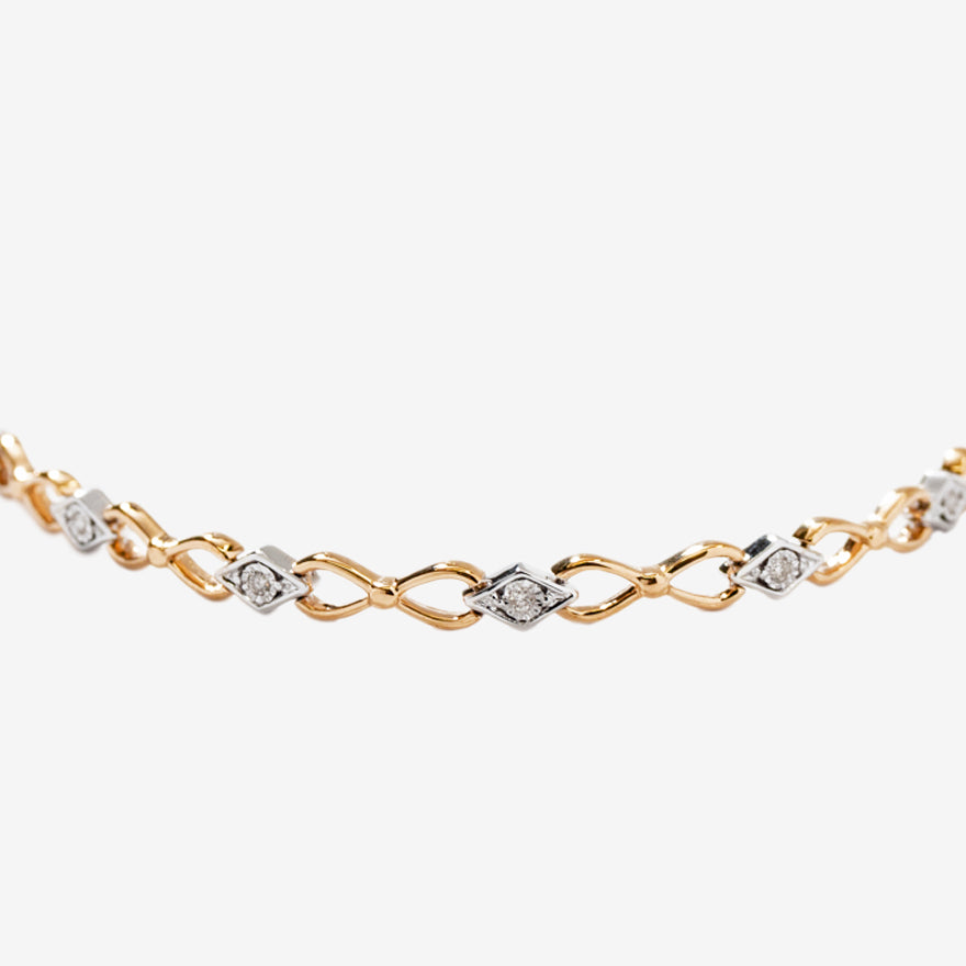 Diamond Link Bracelet in 10K Yellow and White Gold (0.10 ct tw)