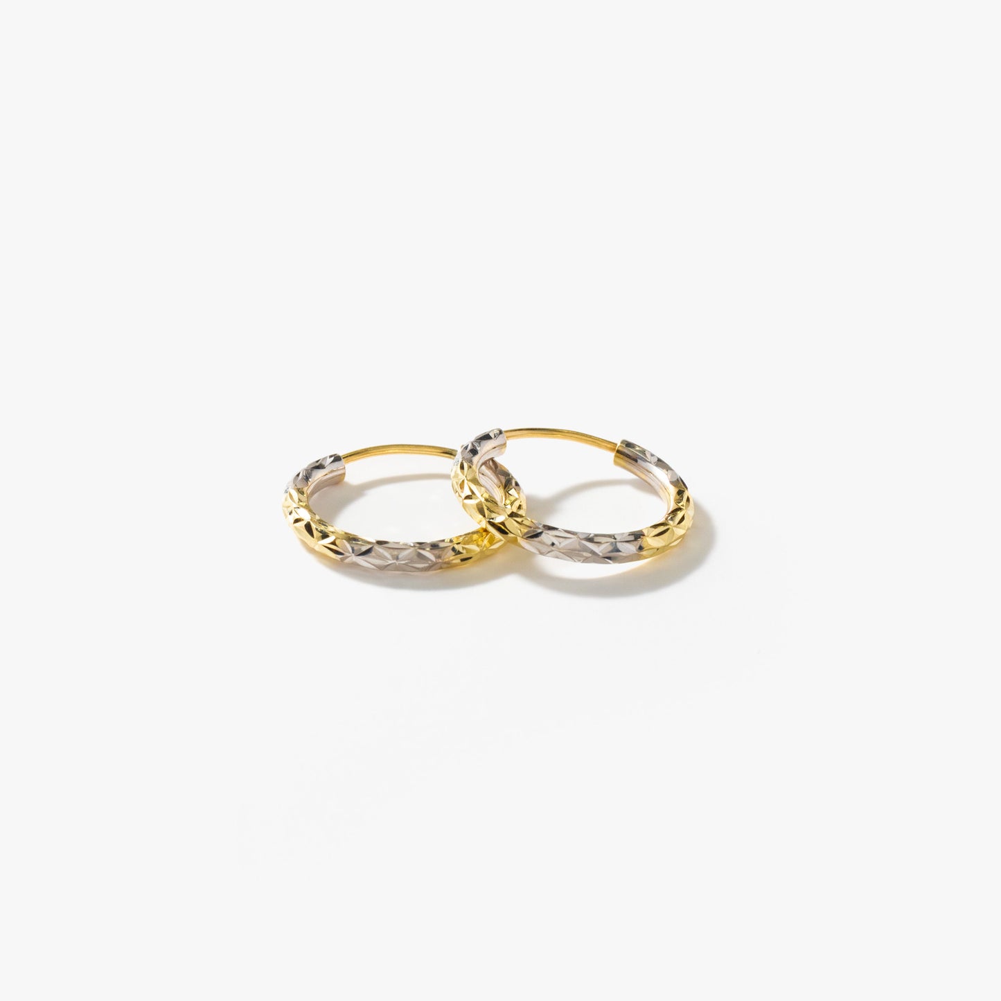 Diamond Cut Hoop Earrings in 10K Yellow and White Gold