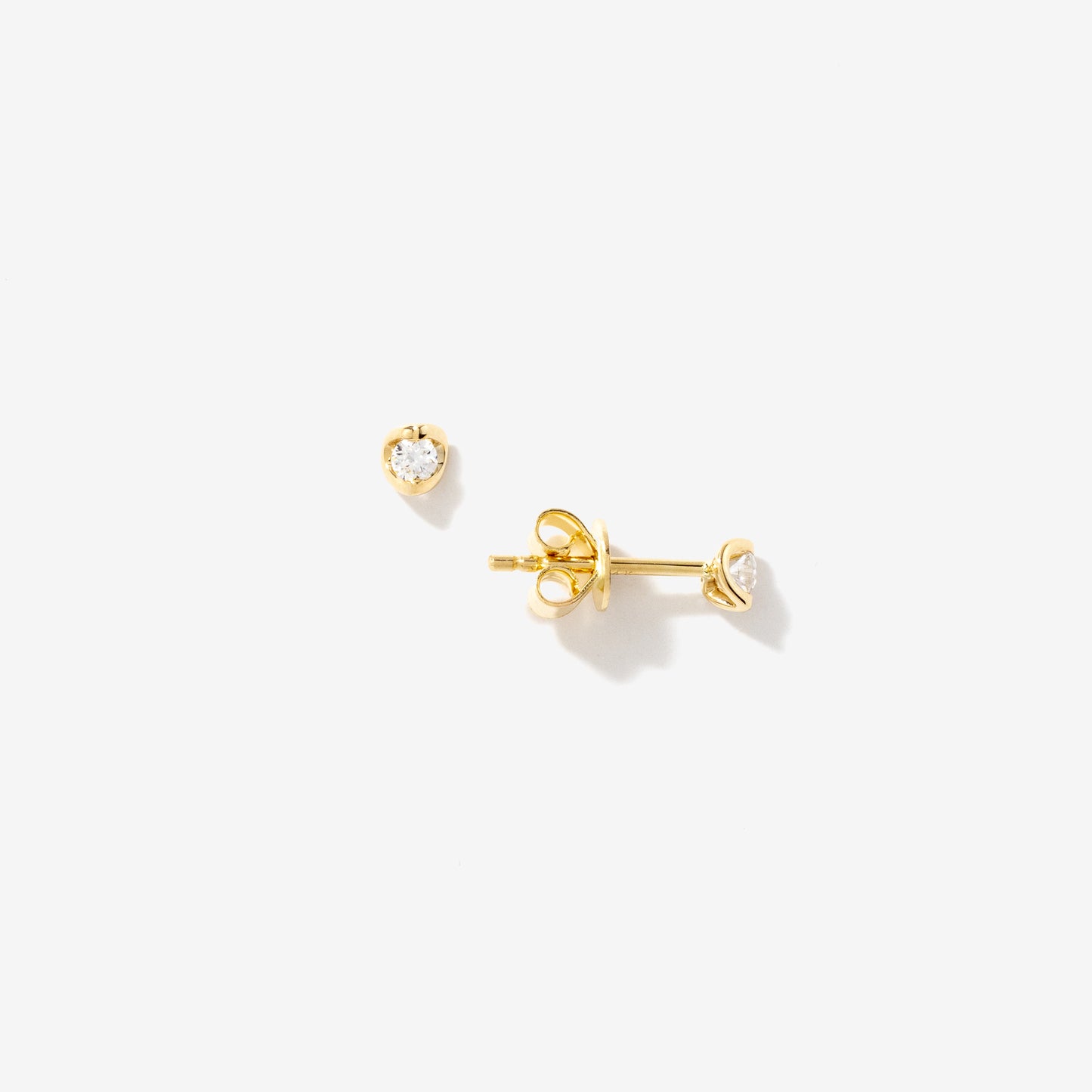 Tension Set Solitaire Lab Grown Diamond Stud Earrings in 14K Yellow Gold (0.10ct tw)
