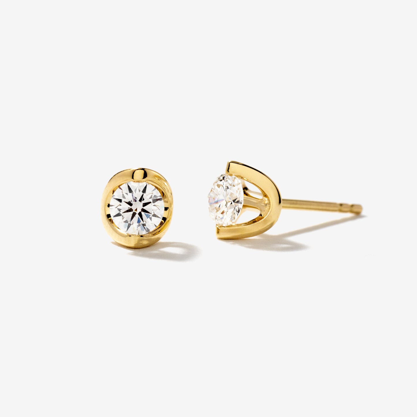 Tension Set Solitaire Lab Grown Diamond Stud Earrings in 14K Yellow Gold (0.50ct tw)