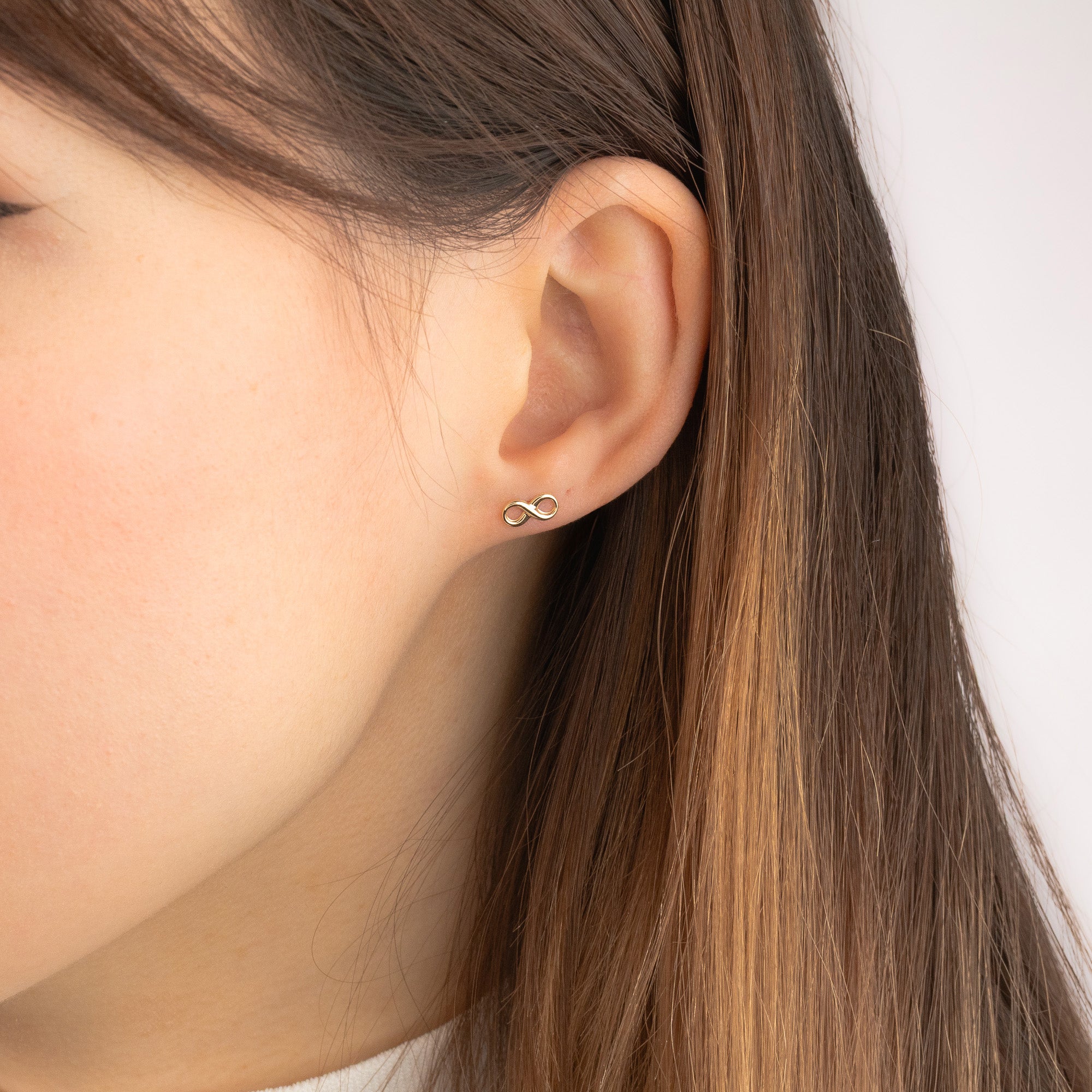 Infinity Stud Earrings In 10K Yellow Gold