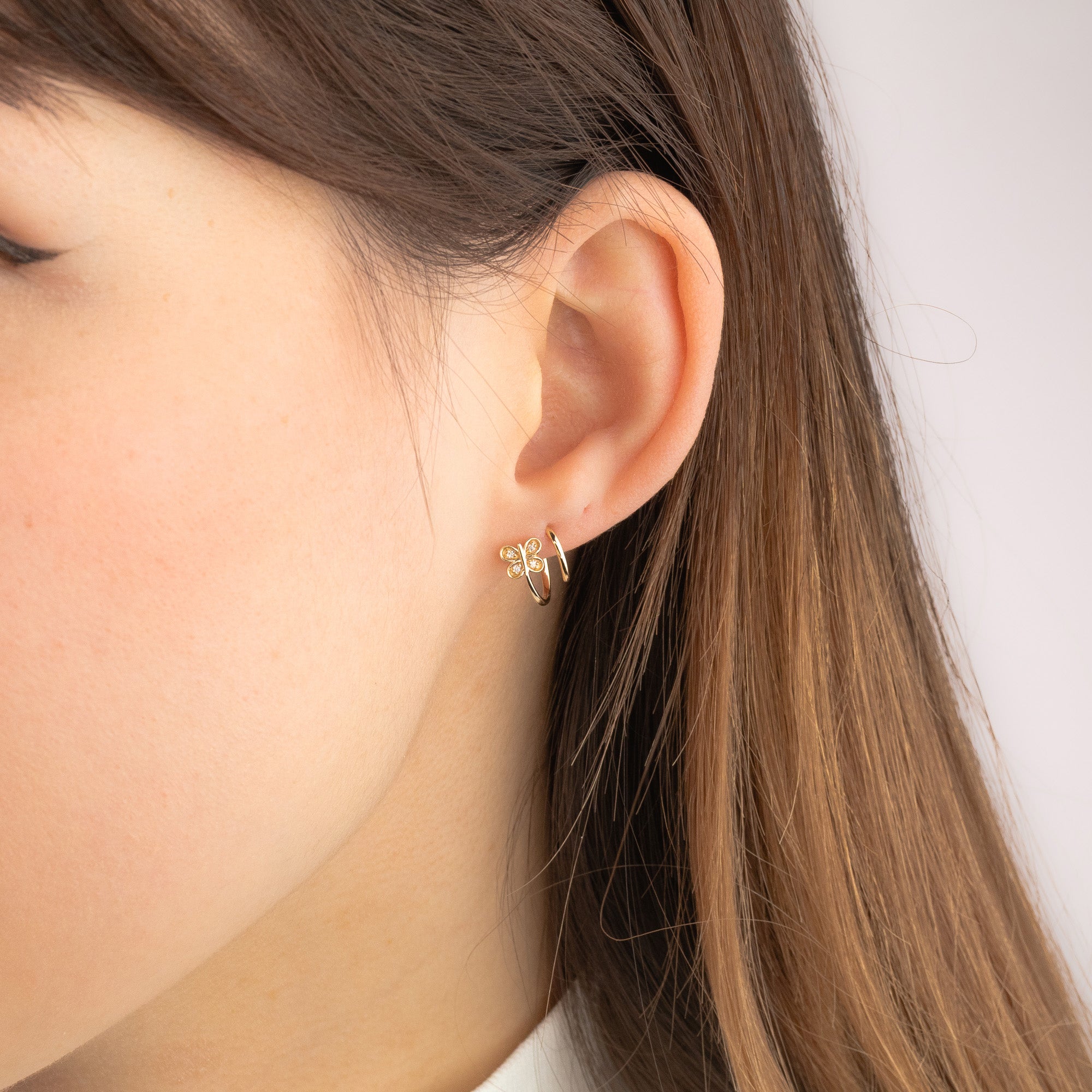 Diamond Butterfly Swirl Earrings in 10K Yellow Gold (0.04 ct tw)