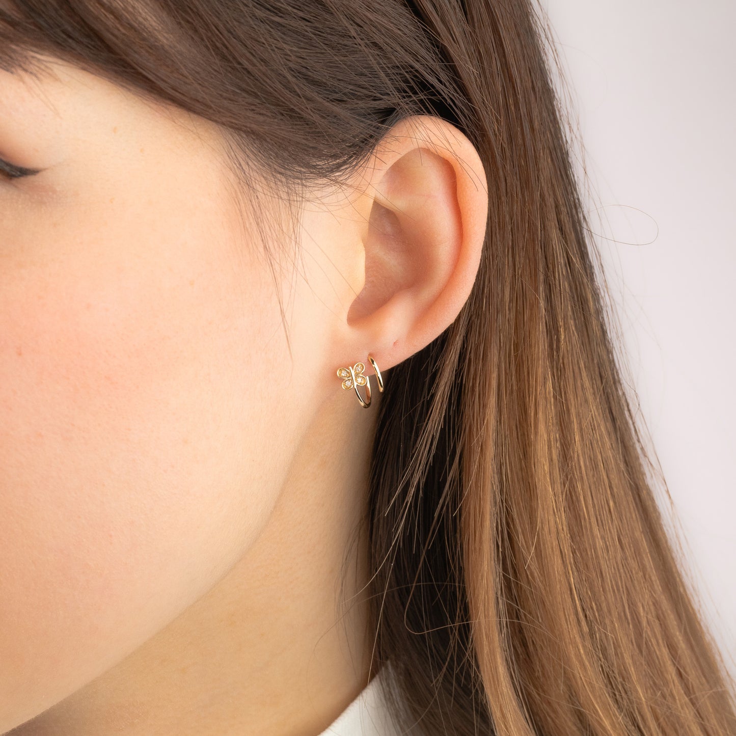 Diamond Butterfly Swirl Earrings in 10K Yellow Gold (0.04 ct tw)