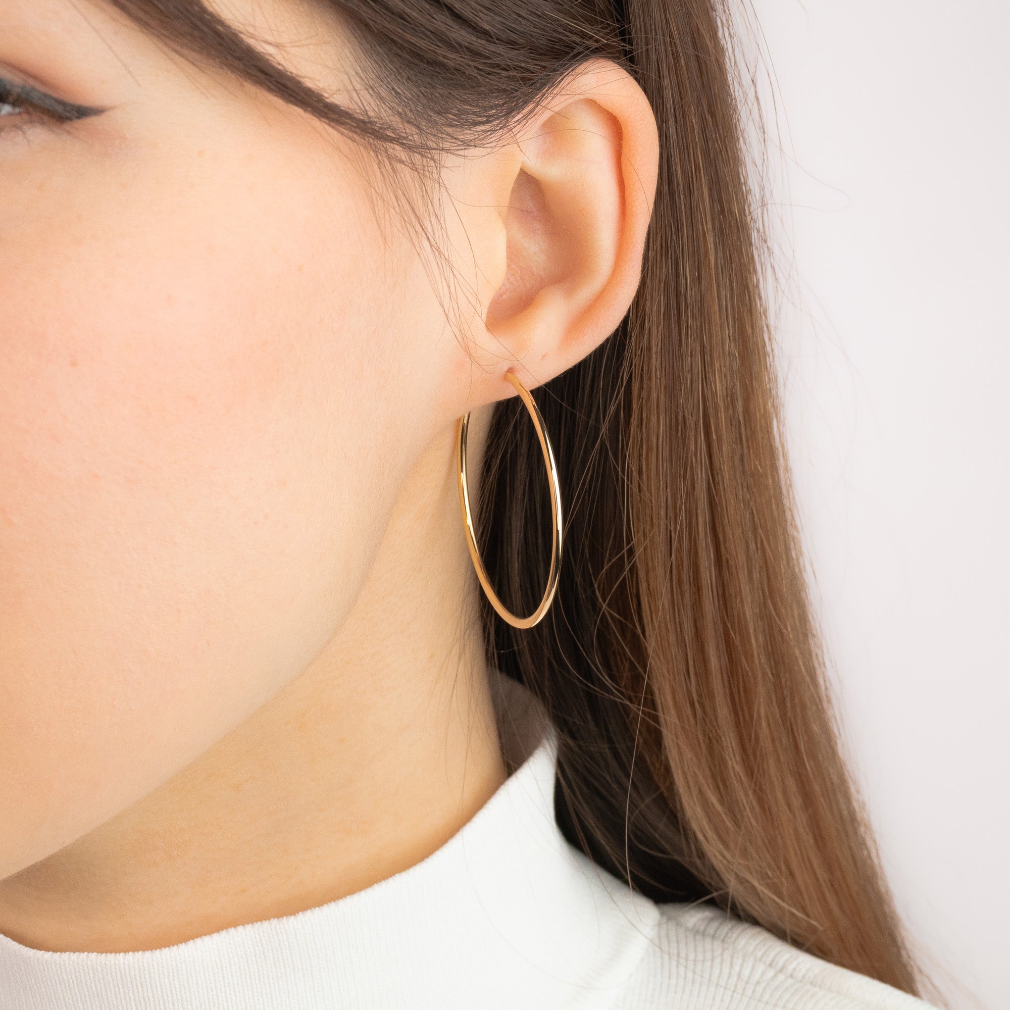 1.6x40mm Sleeper Earrings in 10K Yellow Gold