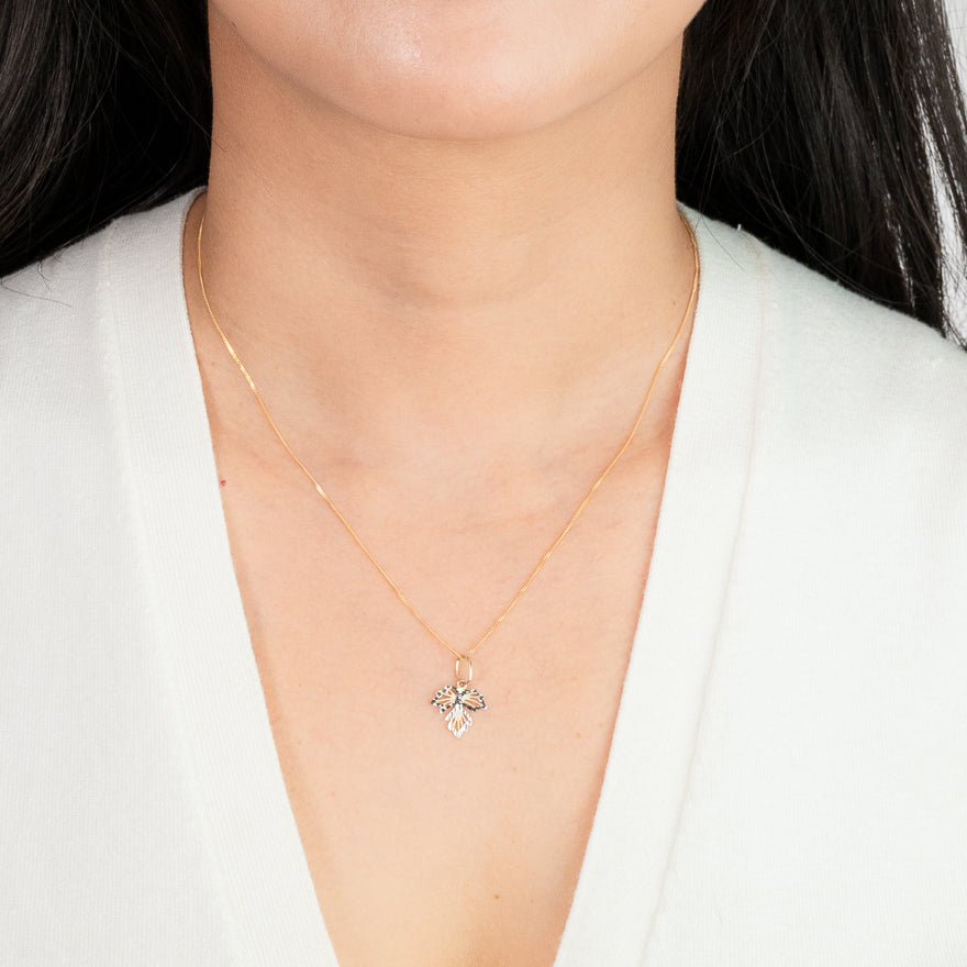 Diamond Cut Leaf Pendant in 10K Yellow and White Gold