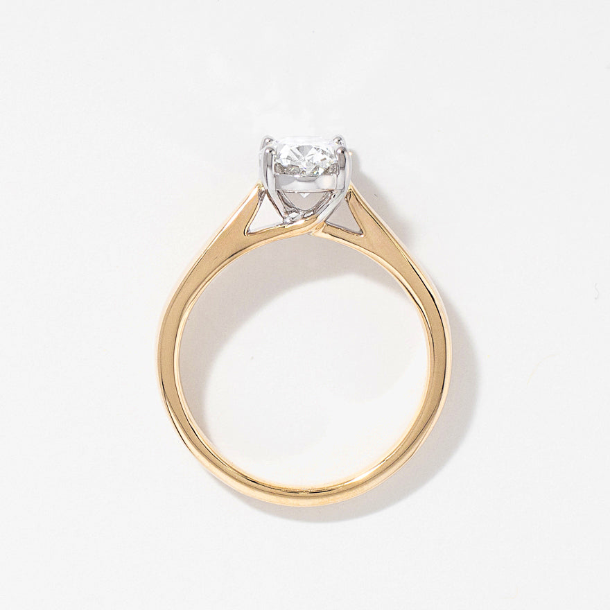 Lab Grown Oval Cut Diamond Engagement Ring in 14K Yellow Gold (1.50 ct tw)