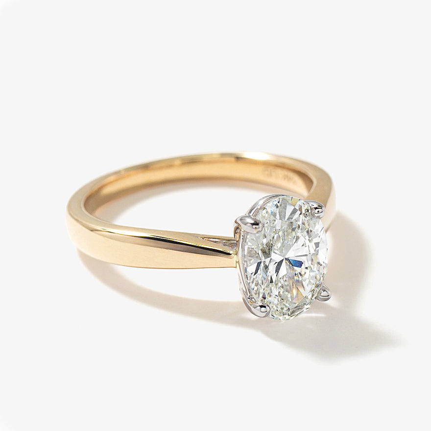 Lab Grown Oval Cut Diamond Engagement Ring in 14K Yellow Gold (1.50 ct tw)