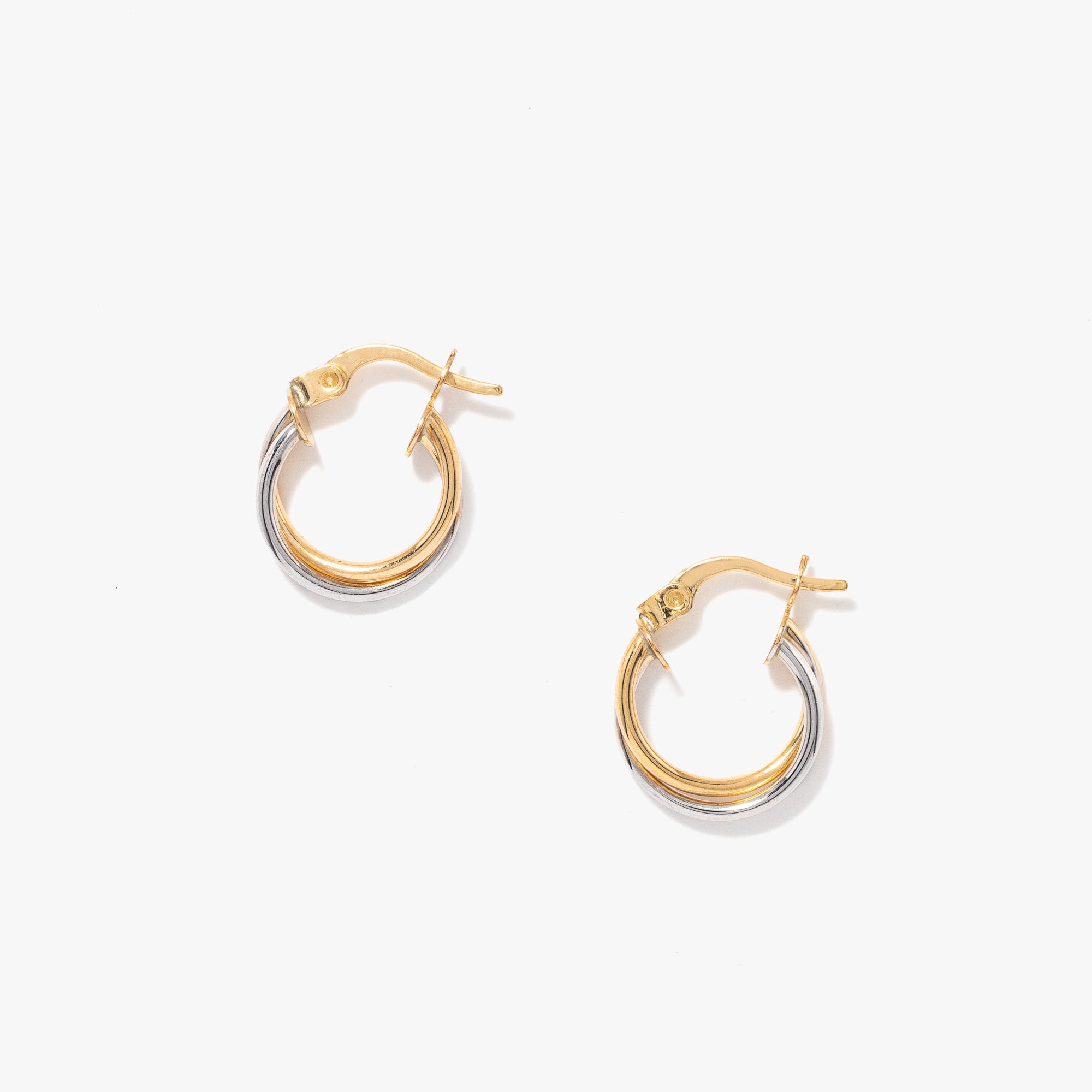 Twist Hoop Earrings in 10K Yellow and White Gold