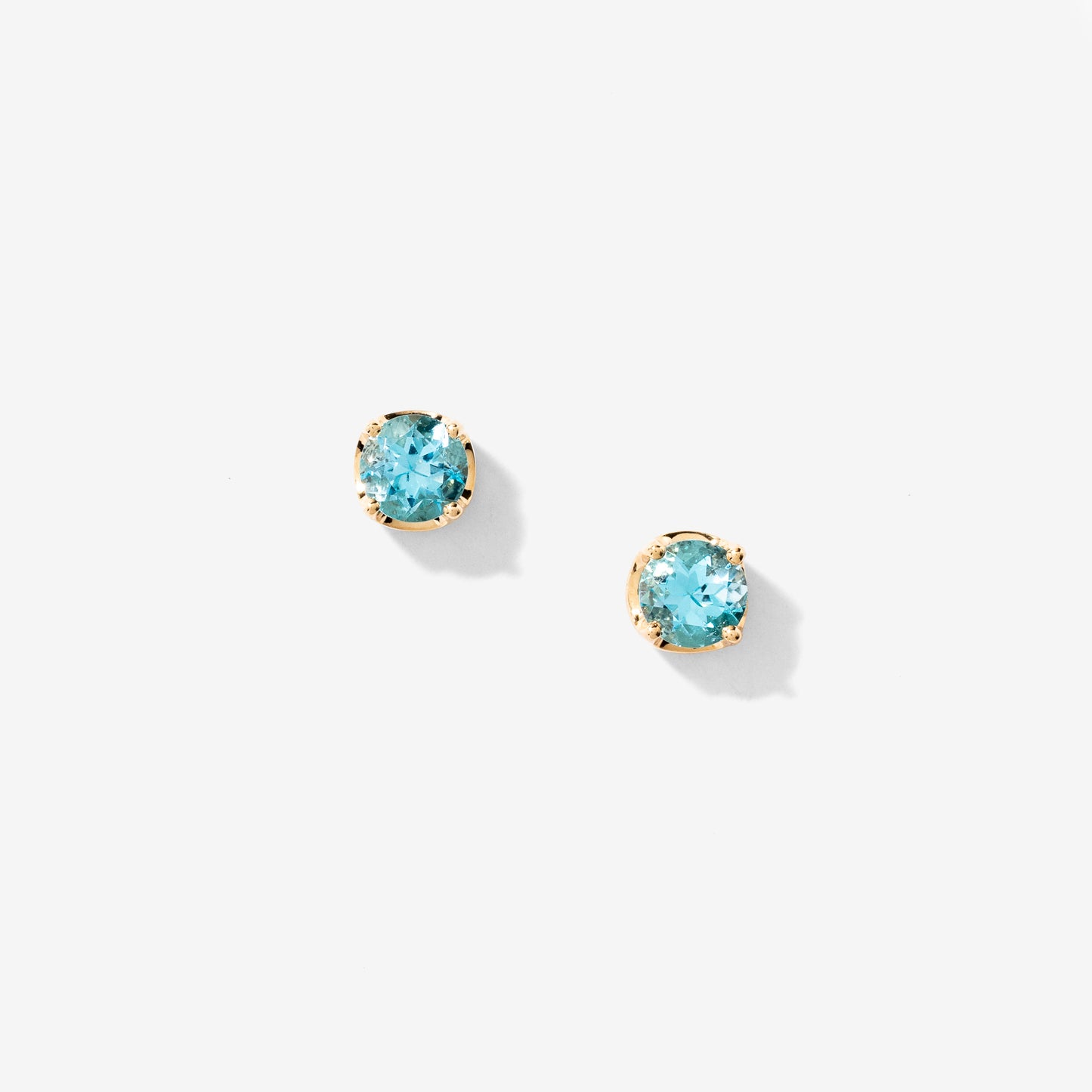 Blue Topaz Stud Earrings in 10K Yellow Gold
