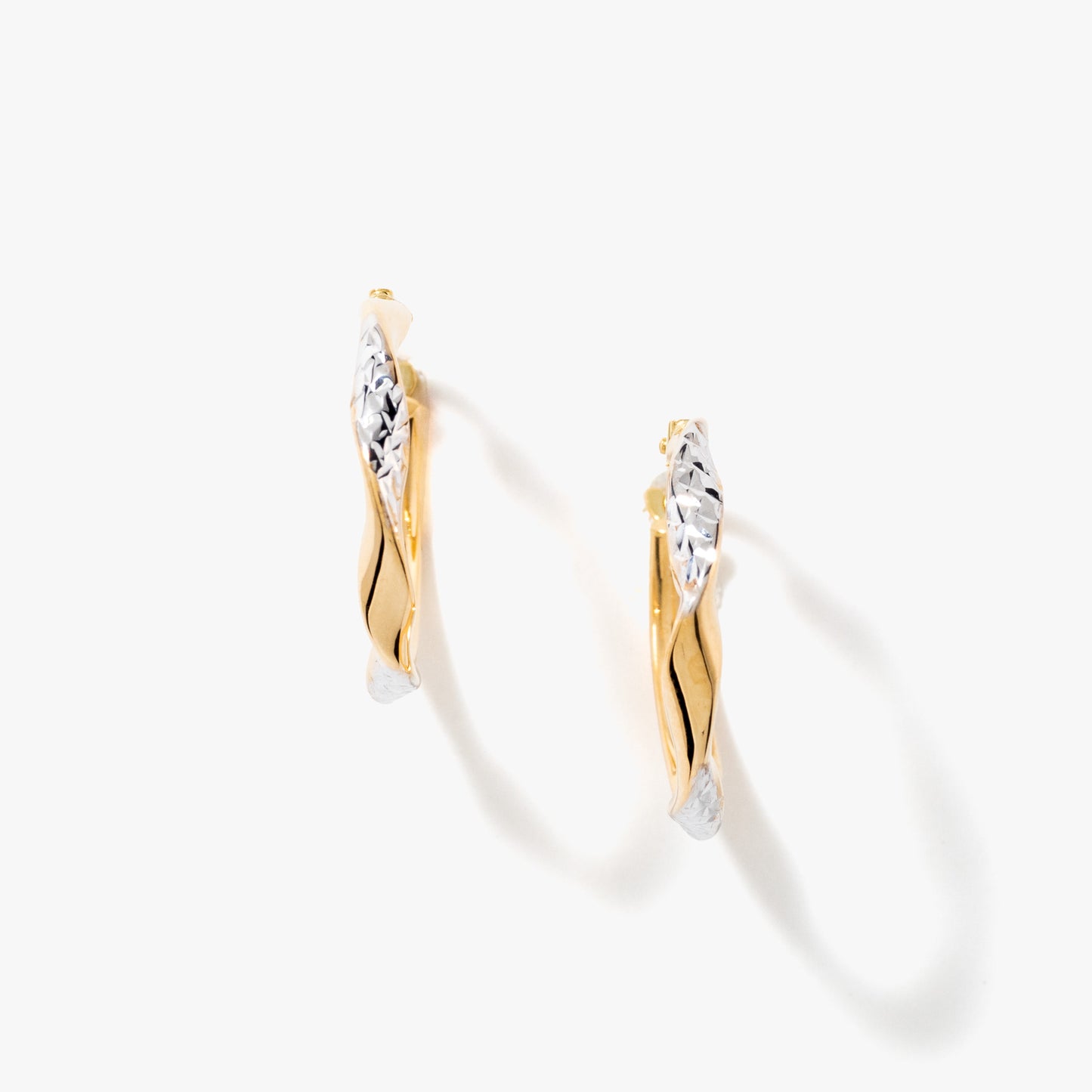 Diamond Cut Twist Hoop Earrings in 10K Yellow Gold