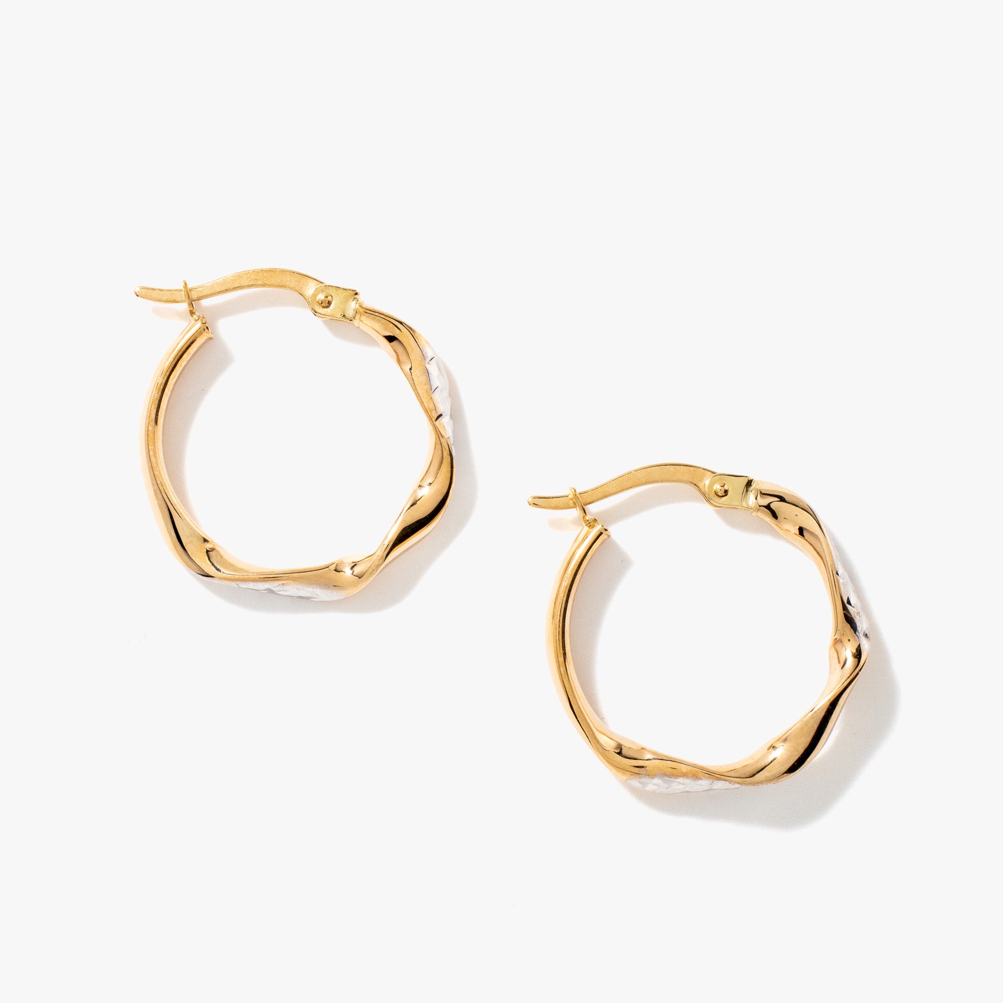 Diamond Cut Twist Hoop Earrings in 10K Yellow Gold