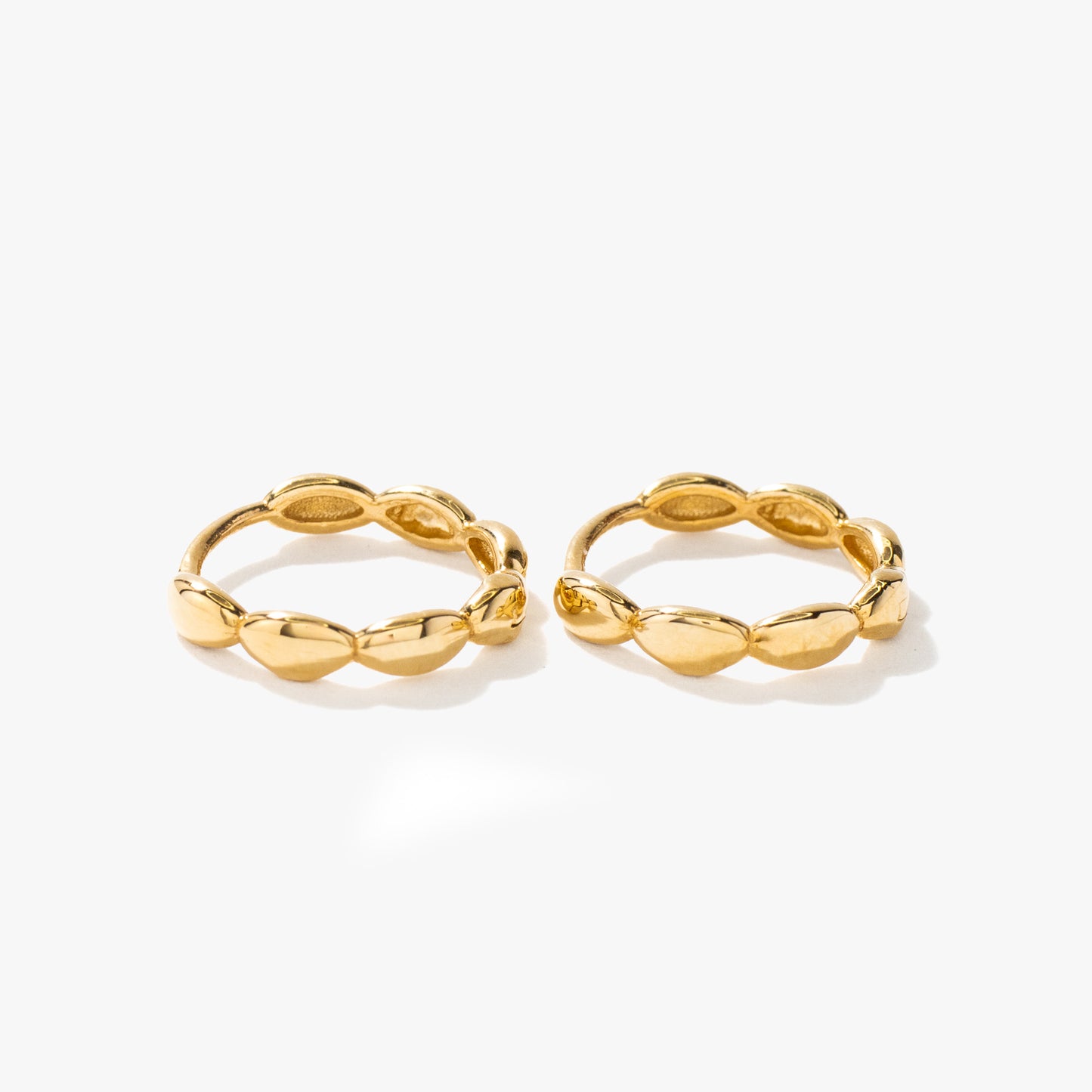 Oval Beaded Huggie in 14K Yellow Gold