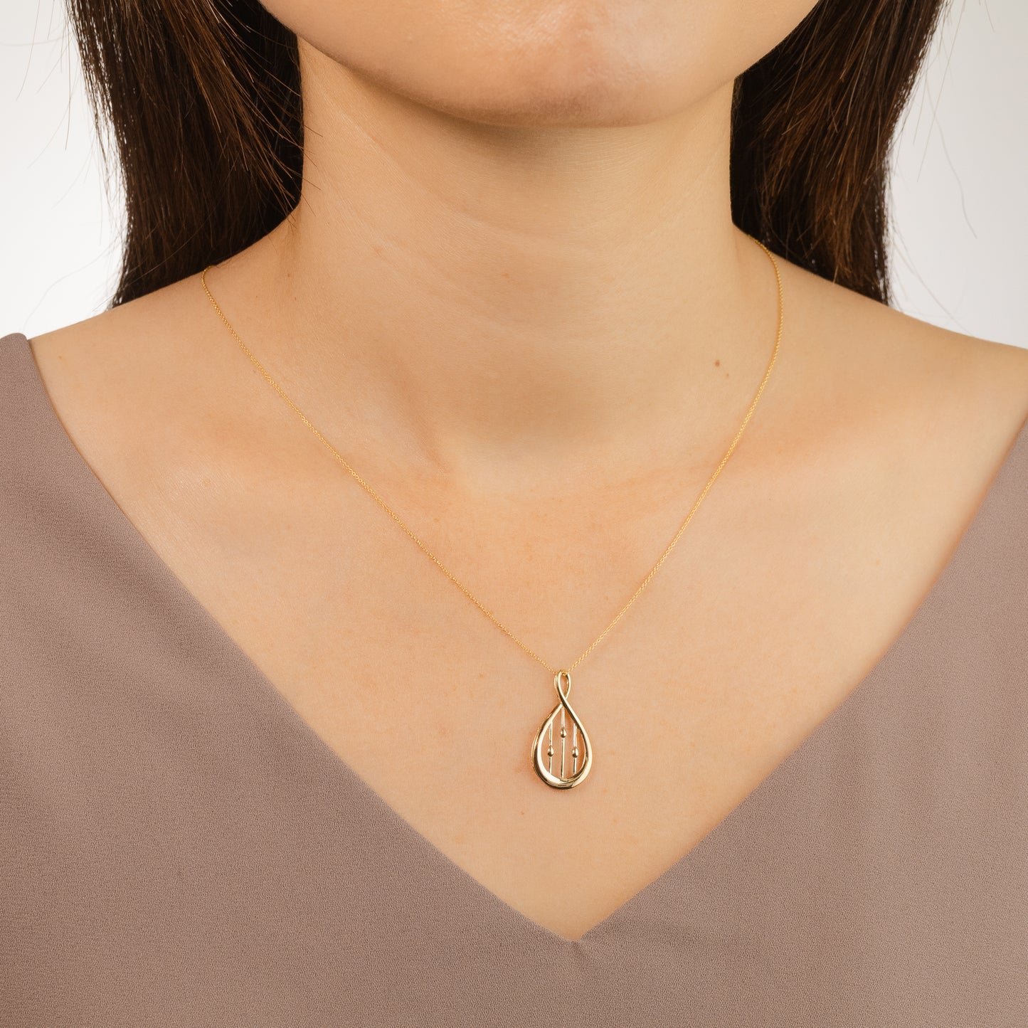 Infinity Pendant in 10K Yellow Gold