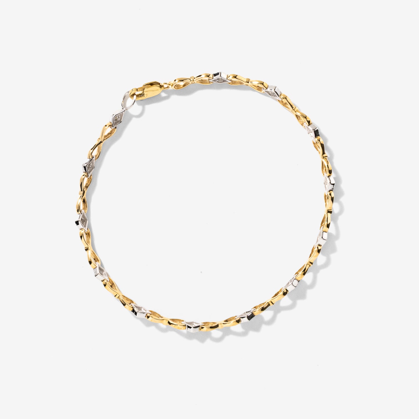 Diamond Link Bracelet in 10K Yellow and White Gold (0.10 ct tw)