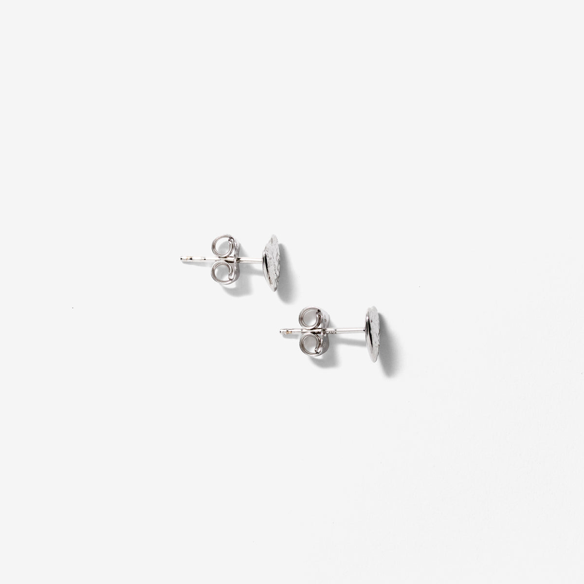 Diamond Cut Heart Puff Stud Earrings in 10K White Gold