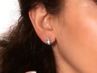 Oval Blue Topaz Earrings in 10K White Gold