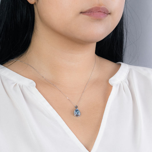 10K White Gold Pear Shape Blue Topaz and Diamond Pendant Necklace