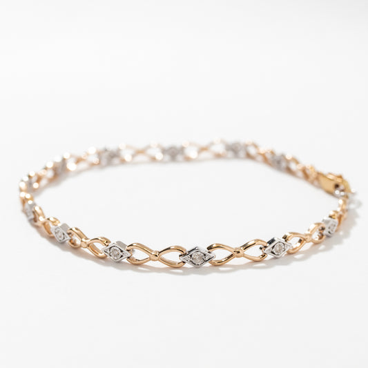 Diamond Link Bracelet in 10K Yellow and White Gold (0.10 ct tw)