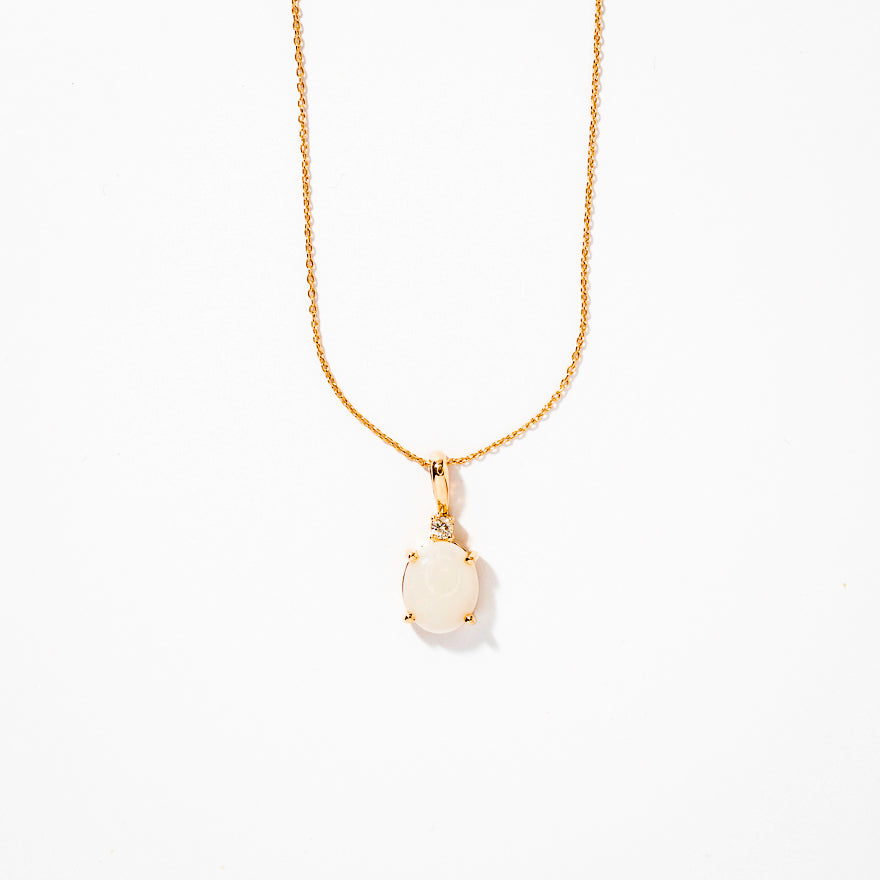 Oval Opal Pendant With Diamond Accent Crafted In 10K Yellow Gold