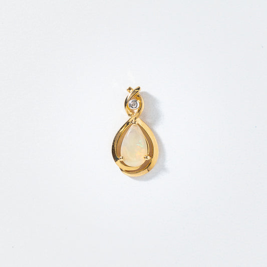 Opal Pendant With Diamond Accent in 14K Yellow Gold