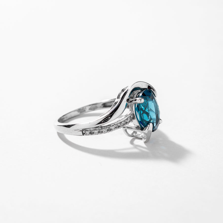 Oval Blue Topaz Ring With Diamond Accents 10K White Gold